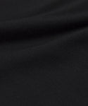 Close-up of soft black fabric with gentle folds and smooth texture—ideal for creating the Grayson Pullover or your favorite lightweight sweater.