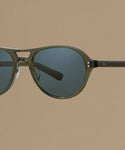 Sunglasses against a beige background.