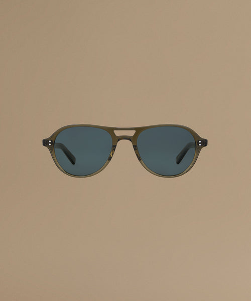 Sunglasses against a beige background.