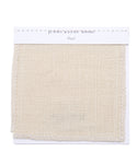 A square Fabric Swatch Pearl Linen in woven beige, labeled Jenn Kayne Home and Pearl at the top, is displayed on a white card with stitching detail along the upper edge.