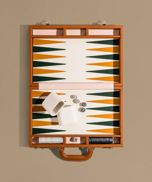 Backgammon set with geometric pattern on a beige background