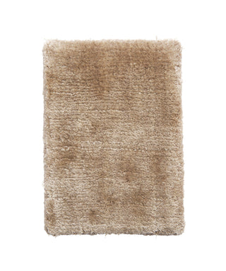 A rectangular, beige shaggy Rug Swatch with a thick, plush texture is shown on a white background, resembling a cozy sample.