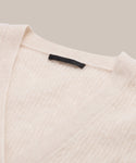 Close-up shot of cashmere brushed v-neck cardigan.