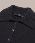 Relaxed knit polo with ribbed collar and three buttons.