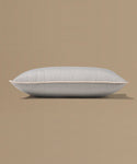 Gray pillow on a beige background