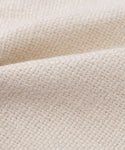 Close-up of the Fabric Swatch Beige Hemp, featuring a textured, grid-like pattern and gentle folds—ideal for upholstery like the Dume Sofa.
