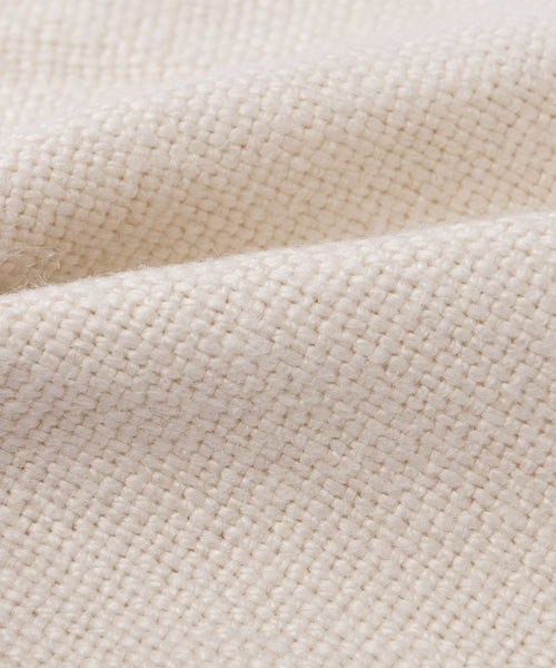 Close-up of the Fabric Swatch Beige Hemp, featuring a textured, grid-like pattern and gentle folds—ideal for upholstery like the Dume Sofa.