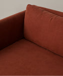 Close-up of the Fabric Swatch Farmhouse Red Linen, highlighting its rich color and textured upholstery material.