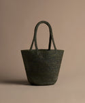 Olive handbag on a beige background