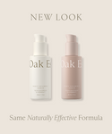 Two bottles of Daily Vitamin C Serum, one white and one blush pink, are shown side by side on a beige background with text saying NEW LOOK and Same Naturally Effective Formula for fading dark spots.