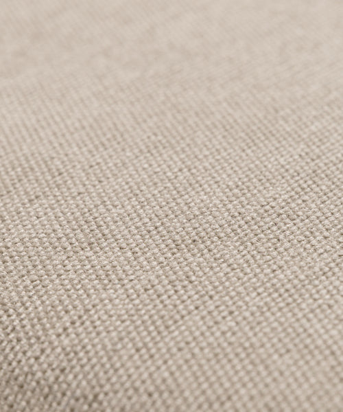 Close-up of the Outdoor Vista Chair Cushion, highlighting its beige Italian woven fabric with a textured, grid-like pattern—ideal for outdoor seating in a soft, neutral tone.