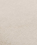 Close-up of a beige, textured fabric on the Outdoor Vista Chair Cushion, featuring a visible woven pattern and small, evenly spaced threads. The slightly rough surface offers a natural look, perfect for outdoor seating or Italian-inspired upholstery.