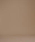 Thumbnail for video: A woman modeling a white short-sleeve crewneck t-shirt against a solid tan studio background.