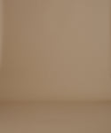 Thumbnail for video: A woman modeling a pair of dark charcoal wide-leg jeans with a light gray t-shirt, standing against a solid beige studio background.