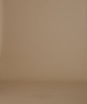 Thumbnail for video: A woman modeling a dark navy ribbed knit sweater with long sleeves paired with cream wide-leg pants, against a solid warm beige studio background.