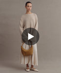 Thumbnail for video: Model wearing Cashmere Amelia Crewneck in Warm Sand.