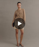 Thumbnail for video: Model wearing Charlotte Cardigan in Camel.