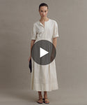 Thumbnail for video: Model wearing Harper Dress in Warm Ivory.