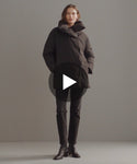 Thumbnail for video: Model walking in-studio wearing Apres Coat.
