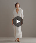Thumbnail for video: Model walking in-studio wearing Cashmere Peyton Cardigan.