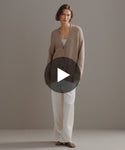 Thumbnail for video: Model walking in-studio wearing Cashmere Spencer Cardigan. 