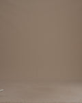 Thumbnail for video: A woman wearing a cream ribbed knit sweater set against a solid warm beige studio background.

