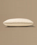 Beige pillow on a beige background