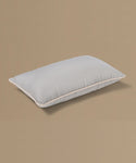 Gray pillow on a beige background