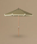 Green patio umbrella with a wooden handle on a beige background