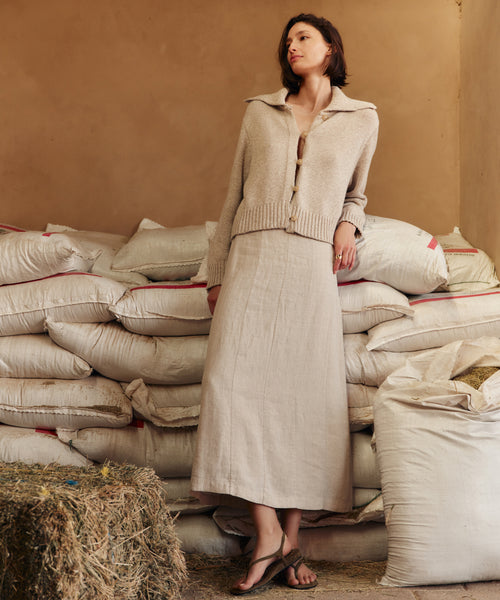 beige cardigan for dress Jenni Kayne Sailor Sweater Size Medium Fit and Flare Drawstring Waist Elastic cuffs Buttons past the knee Model is 55 and is wearing a small Beige Button-Front Dress - Cardigan