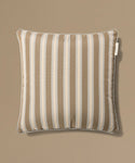 Stripe pillow against beige background