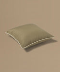Brown pillow on a beige background