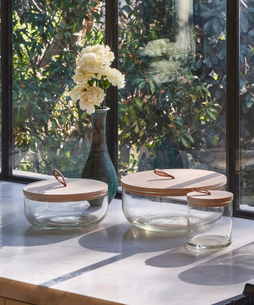 Glass canisters in a kitchen.