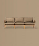Brown sofa with wooden frame on a beige background