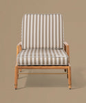 Chair with striped cushion on a beige background