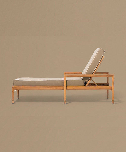Wooden lounge chair with beige cushion on a beige background