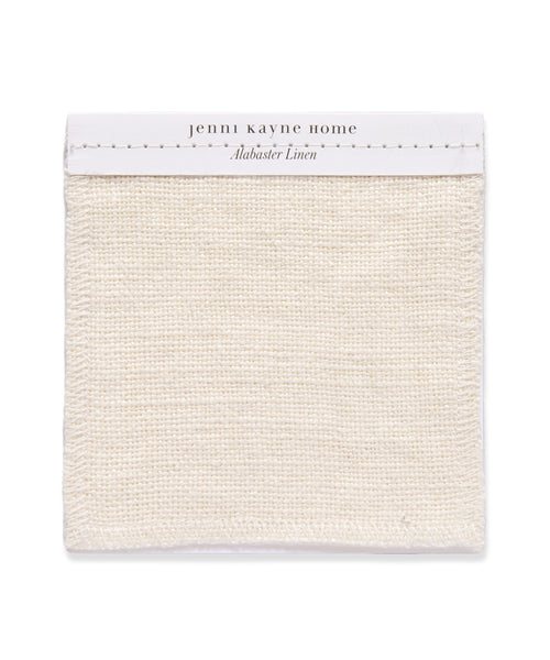 A square Fabric Swatch Alabaster Linen in textured ivory, shown on a white card—ideal for upholstering your Dining Arm Chair or Sunset Dining Chair.