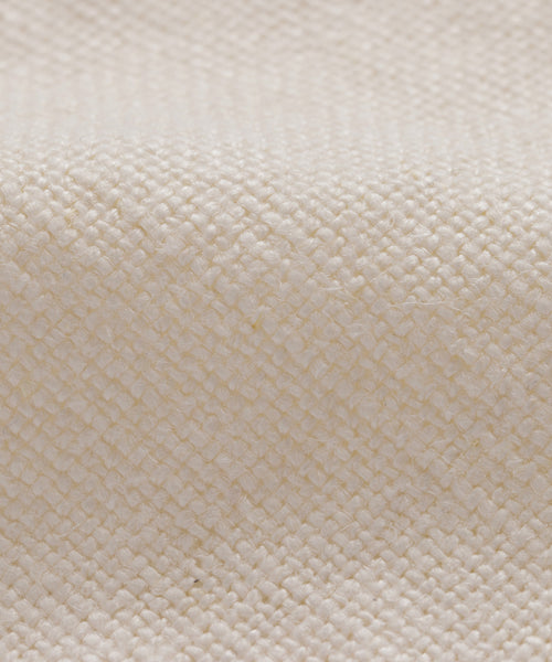 Close-up of Fabric Swatch Alabaster Linen: textured, off-white woven fabric with a detailed interlaced pattern and gentle fold—ideal for the Sunset Dining Chair or Dining Arm Chair.
