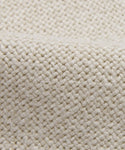 Close-up of Fabric Swatch Sandstone Linen, highlighting its coarse woven texture and interlaced natural fibers in a diagonal pattern. The thick, durable material is ideal for upholstery or craft projects.