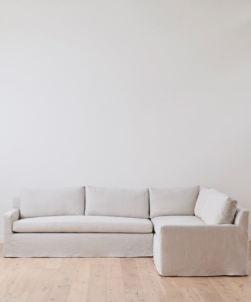 The Harbor Sectional from Jenni Kayne Furniture adds effortless elegance to your space, featuring a Belgian flax linen sofa designed for both relaxation and style.