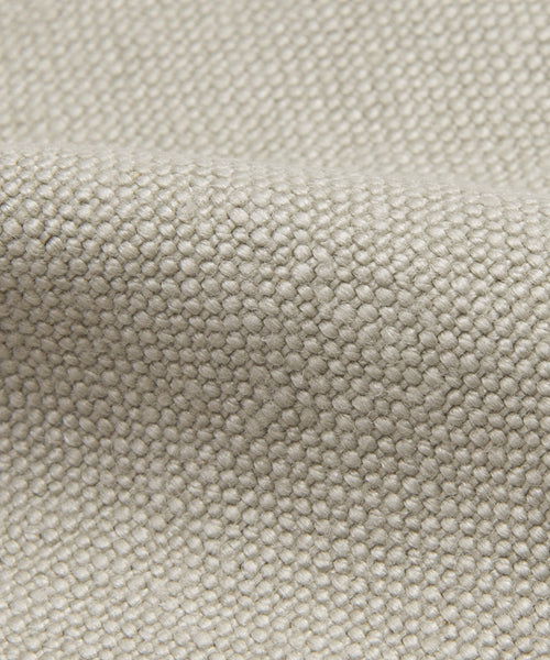 A close-up of the Fabric Swatch Stone Linen highlights its delicate texture, making it an ideal choice to enhance your Pacific Bed decor.