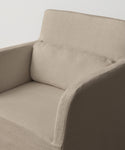 A close-up view of the Sunset Dining Arm Chair in beige linen, featuring a matching rectangular seat cushion, set against a plain white background.
